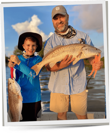 about-image01-v2 captain and kid with saltwater Red Drum after fishing trip