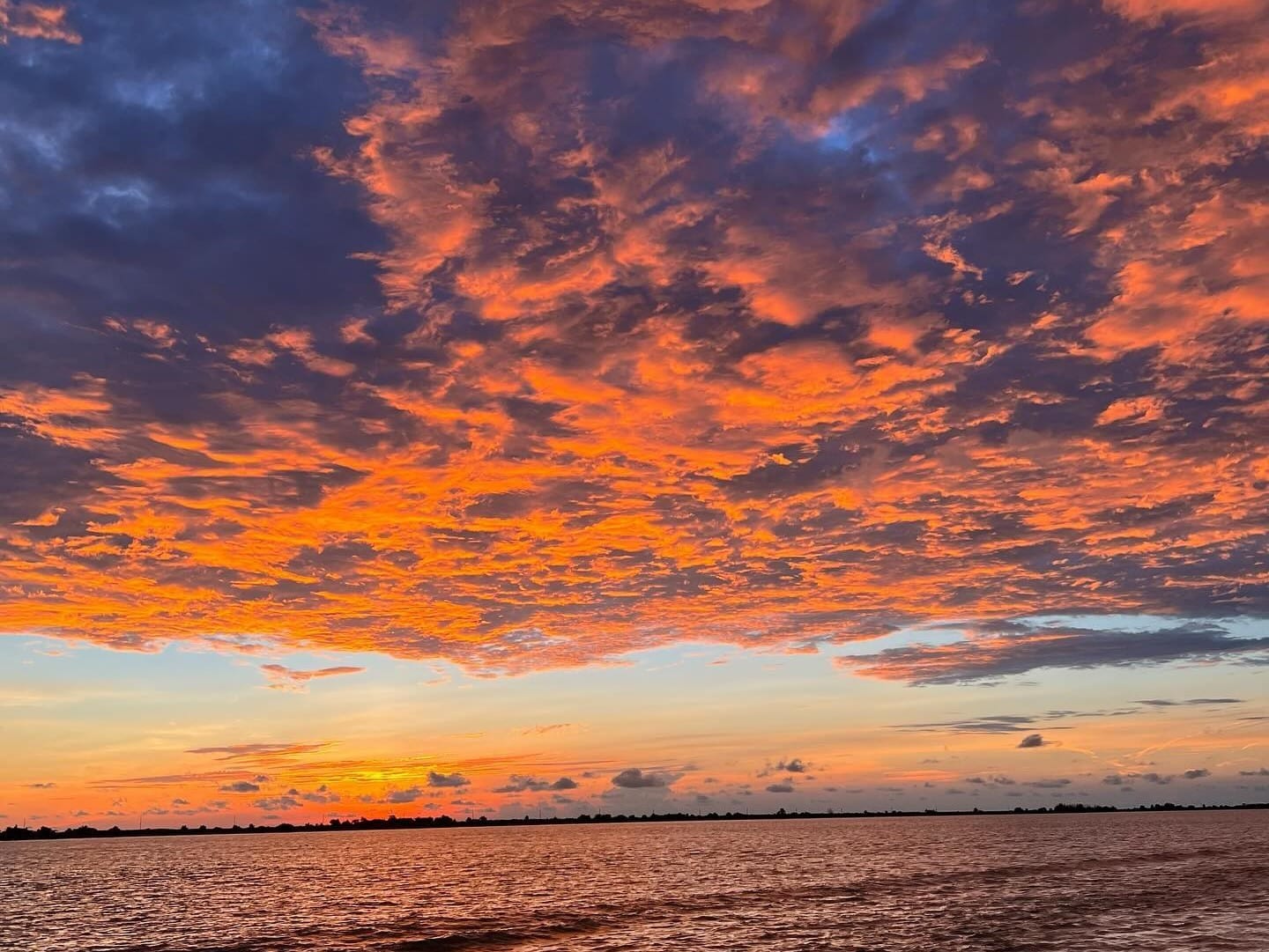 Sunrise on a river near New Orleans